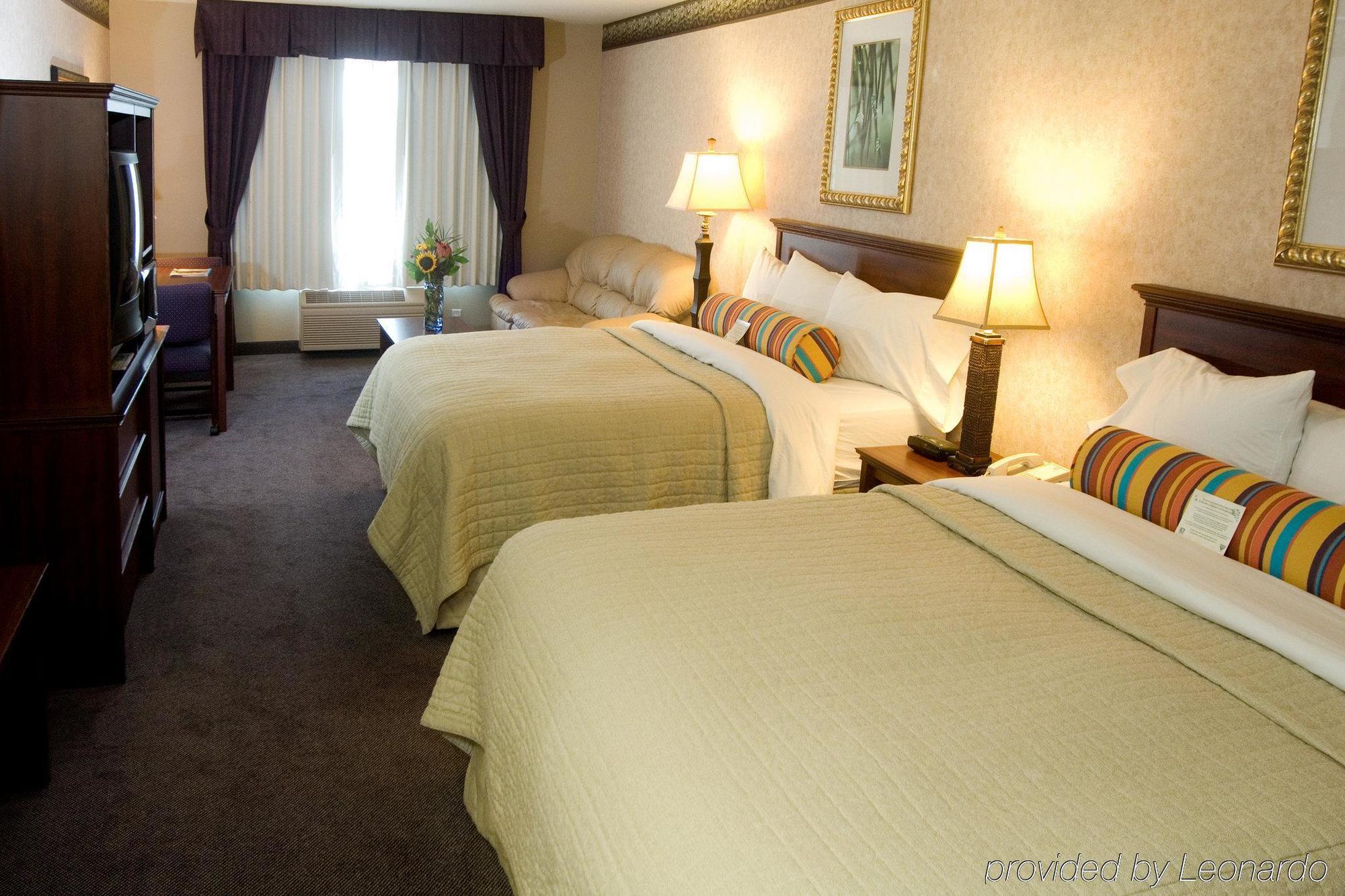 Phoenix Inn Suites Олбани Стая снимка